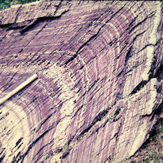 Colourful rock formation, showing many layers