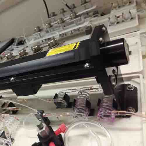 Scientific equipment sat in a white lab.