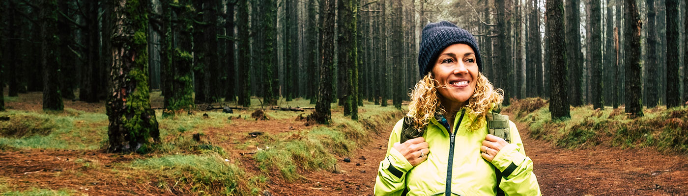 Person walking through a forest